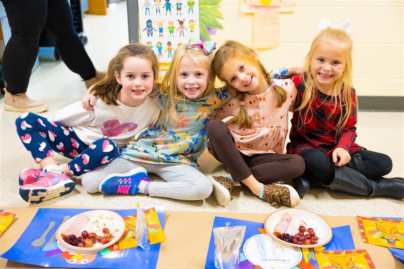 Students eat a Thanksgiving snack